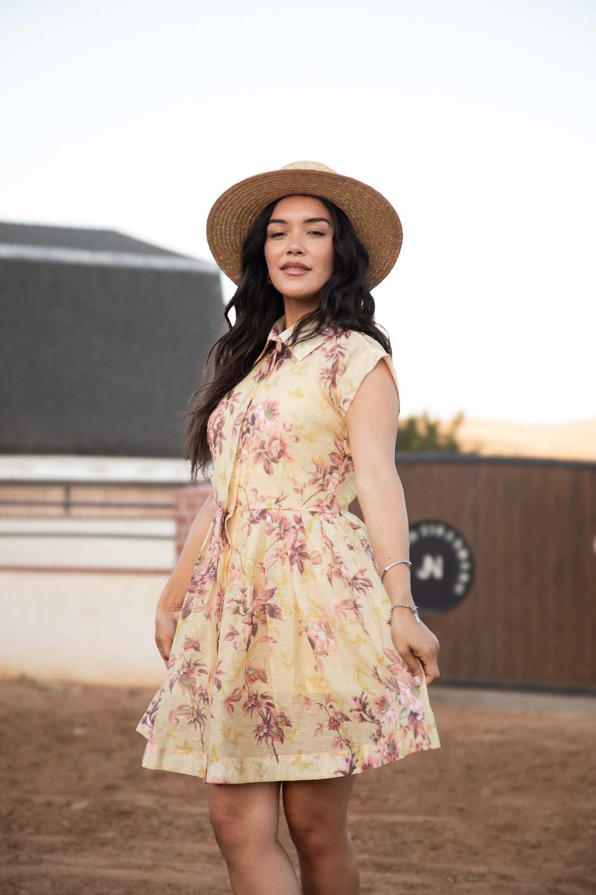 Chloe Dress yellow floral mini with a fitted waist and button-front bodice