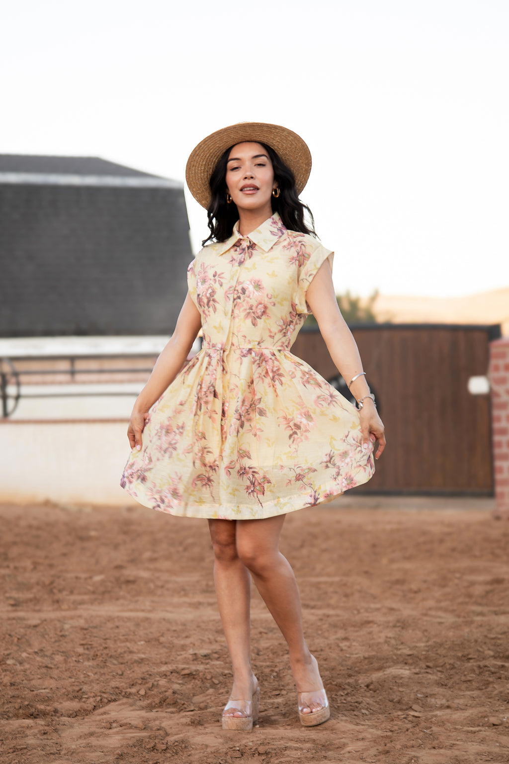 Back view of the Chloe Dress showing the pleated floral skirt